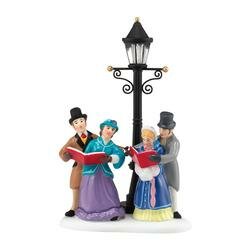 CAROLING BY LAMPLIGHT